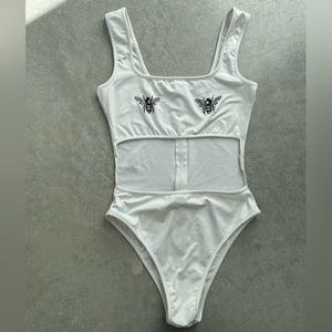 White boob bees body suit